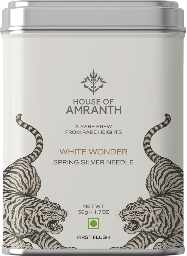 White Wonder · Silver Needle loose-leaf tea in a House of Amranth metal caddy